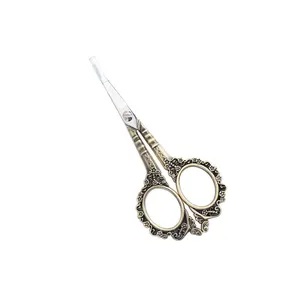 M&X TIJERA ROCOCO BRONCE